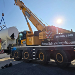 Mobile crane lifting rooftop HVAC unit in Lancaster County, PA with certified operators providing safe commercial equipment installation services today
